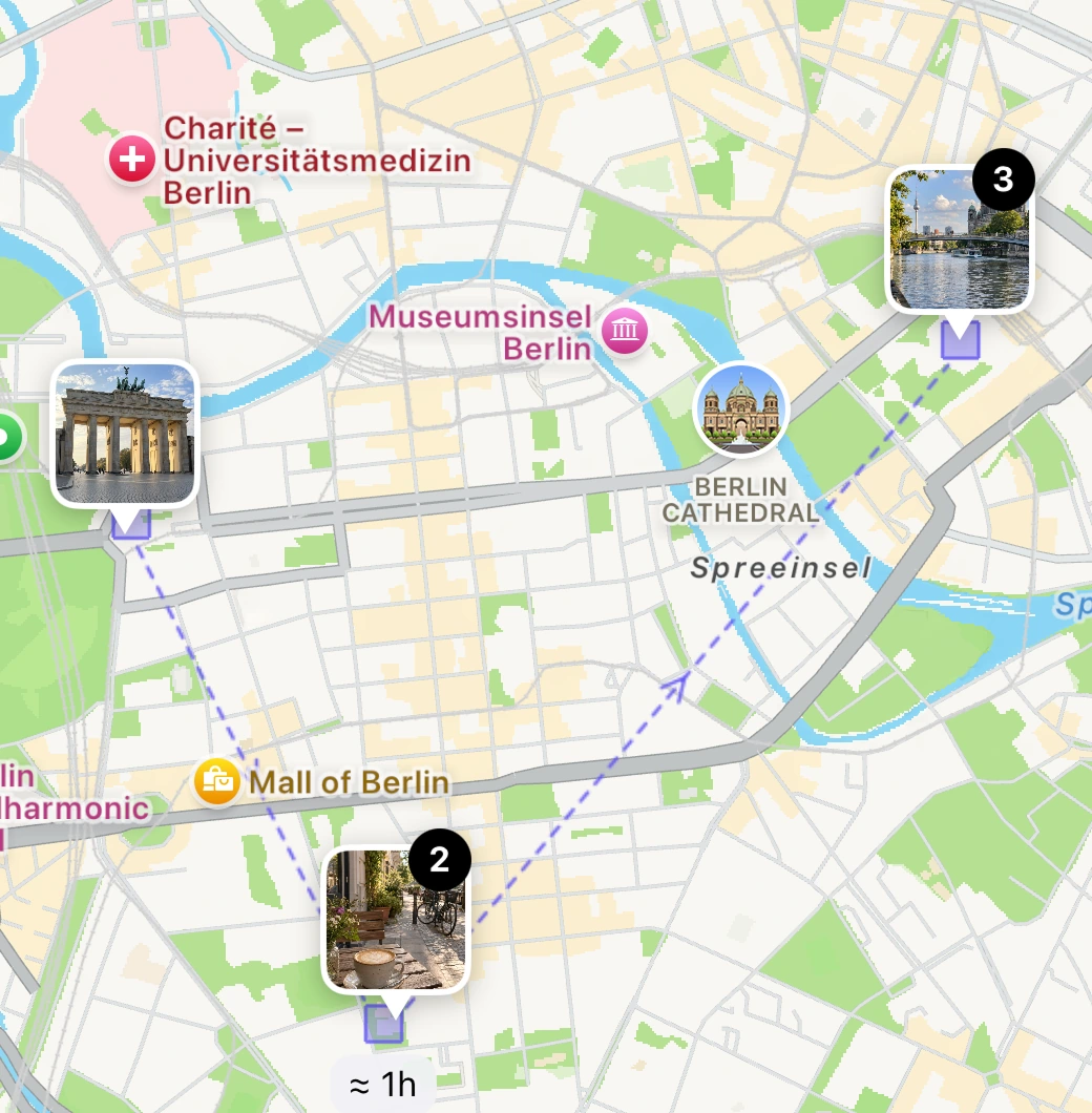 The Day Detail map of Berlin, with photo markers at the Brandenburg Gate, a café, and the river, connected by the day’s route.